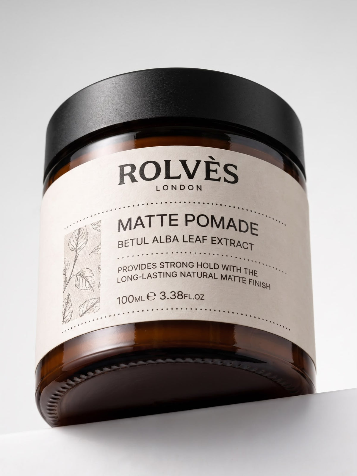 ROLVES Matte Pomade 100 ml, siyah kapaklı amber cam kavanoz