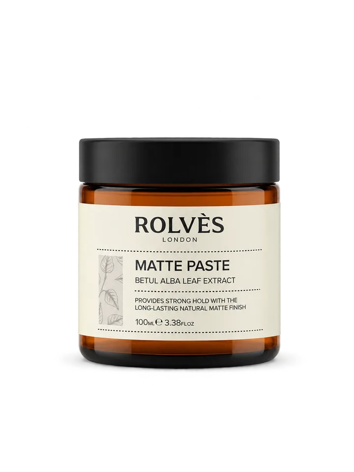 Matte paste kavanozu, siyah kapak ve amber dipli; ROLVES London beyaz etiket